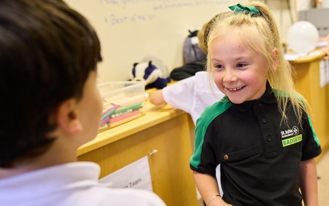 Young Badger girl smiling at Sett meeting. Young Badger girl smiling at Sett meeting.