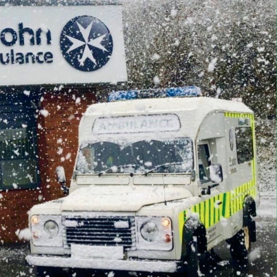 St John Ambulance ambulance driving in a snow blizzard.