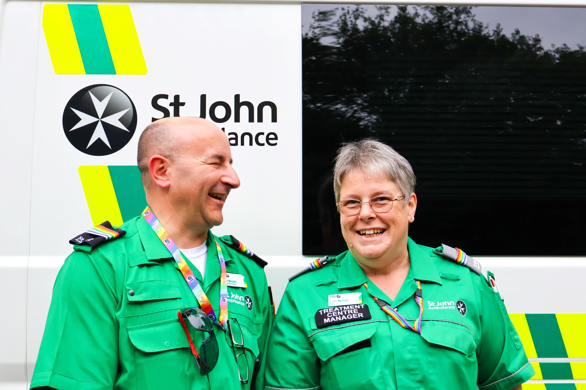 Volunteers-smiling-ambulance.jpg